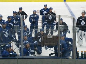 The Leafs listen to coach Randy Carlyle at their game-day skate on Wednesday, Oct. 8, 2014. (DAVE HILSON/Toronto Sun)