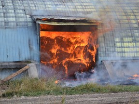 An eight-year-old boy admitted to starting a huge bale blaze in Mayerthorpe on Saturday, Oct. 4, 2014. (Kevin Hampson/QMI Agency)