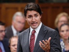 Liberal leader Justin Trudeau speaks during question period in the House of Commons on Parliament Hill in Ottawa October 7, 2014. (REUTERS/Chris Wattie)