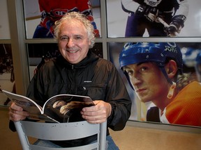Kingston writer Larry Oakley at the Original Hockey Hall of Fame at the Invista Centre. Oakley wrote a poem about Wayne Gretzky which will on display at the hall. (Ian MacAlpine/The Whig-Standard)