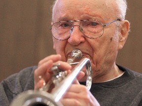 Trumpet player Nestor Mudry, 93, practices with the Murray Riddell Big Band in Winnipeg, Man. Tuesday, Oct. 7, 2014. Mudry will be playing in the upcoming Seniors Music Fest.