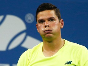 Milos Raonic (above), Vasek Pospisil and Daniel Nestor were eliminated from the Shanghai Masters on Wednesday. (Reuters file photo)