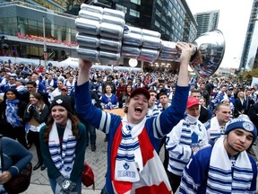 Leafs fans in Maple Leafs Square ahead of the start of the season opener Wednesday, Oct. 8, 2014. (Craig Robertson/Toronto Sun)