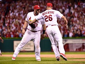 St. Louis Cardinals relief pitcher Trevor Rosenthal (26) celebrates with first baseman Matt Adams (32) after defeating the Los Angeles Dodgers in their playoff series. (USA Today Sports)