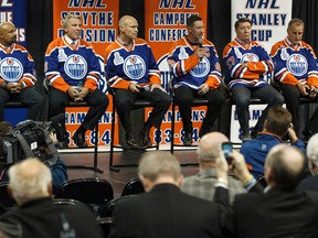 Hall of Famers, from left, Grant Fuhr, Glenn Anderson, Mark Messier, Wayne Gretzky, Jari Kurri and Paul Coffey sat together onstage and answered media queries during a brief question and answer session at Rexall Place on Wednesday. (Ian Kucerak, Edmonton Sun)