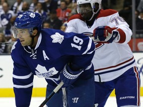 Maple Leafs winger Joffrey Lupul is cross-checked by Canadiens alternate captain P.K. Subban on Wednesday night at the ACC. (Craig Robertson/Toronto Sun)