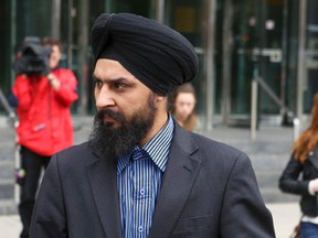Sukhvinder Singh Rai leaves Hamilton court Wednesday October 8, 2014 after receiving bail on new charges brought on by the crash with his truck on the Burlington Skyway. (Dave Thomas/Toronto Sun)