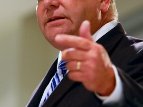 Doug Ford speaks during the Leaside Property Owners' Association mayoral candidate debate at Leaside Memorial Arena in Toronto on Tuesday October 7, 2014. (Dave Abel/Toronto Sun)