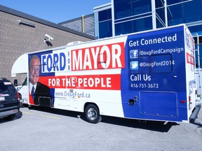 Doug Ford unveils a new RV with his photo on it for campaigning on Thursday October 9, 2014. (Michael Peake/Toronto Sun)