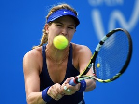 Eugenie Bouchard of Canada hits a return to Petra Kvitova of the Czech Republic during the final of the Wuhan Open tennis tournament in Wuhan, in China's Hubei province on September 27, 2014. (AFP PHOTO/Greg BAKER)