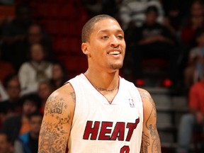 Michael Beasley of the Miami Heat smiles for the camera against the New Orleans Pelicans at the American Airlines Arena in Miami, Florida on Jan. 7, 2014. (Issac Baldizon/NBAE via Getty Images/AFP)
