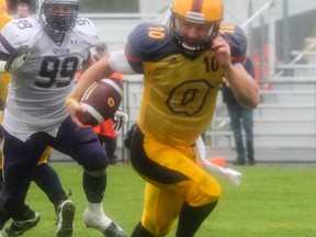 Queen's quarterback Billy McPhee and the Gaels host the Toronto Blues on Saturday. (Whig-Standard file photo)