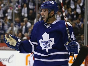 Nazem Kadri celebrates on Wednesday after tipping in a shot for his first goal of the season. Kadri says the team will need “four, five, six games” to get used to new systems and coaches. (CRAIG ROBERTSON/Toronto Sun)