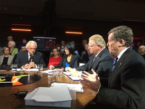 Dale Goldhawk, left, moderates the debate between Olivia Chow, Doug Ford and John Tory. (STAN BEHAL/Toronto Sun)