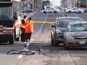 A cyclist was struck and killed in a collision on Warden Ave. north of Eglinton Ave. E. on Thursday, Oct. 9, 2014. (MANNY RODRIGUES/Toronto Sun)