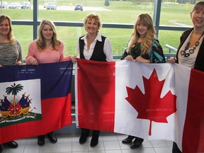 Lambton College students Alex Filia, Tammy Martin and Nikki Hayter are readying for the first Global Citizenship Summit with college staff members Ruth Geurts, Amy Weiler and Ruth Drewitt. The Oct. 29 event features a multicultural dinner and speaker panel open to the public. (BARBARA SIMPSON, The Observer)