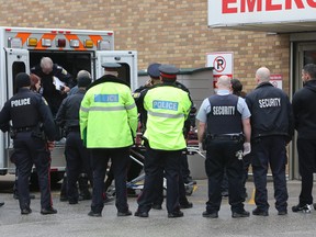 Const. Mike Klarenbeek was rushed to a Toronto hospital after a courthouse shooting in Brampton on March 28, 2014. (DAVE THOMAS, Toronto Sun)