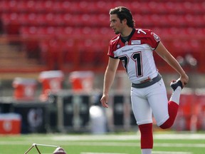 Tyler Crapigna practises with the Calgary Stampeders this summer. The McMaster star holds the new OUA field-goal record. (QMI Agency)