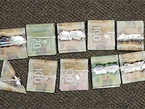 RCMP seized $21,000 in Canadian cash and a small amount of marijuana.
