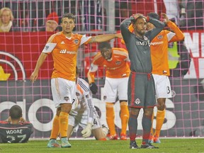 Toronto FC forward Jermain Defoe reacts after a missed scoring opportunity against the Houston Dynamo on Wednesday night. (USA TODAY SPORTS)