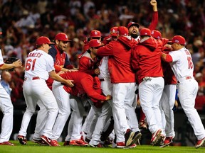 The St. Louis Cardinals celebrate their NLDS win over the Los Angeles Dodgers. (USA Today Sports)