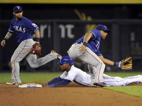 Royals' Jarrod Dyson steals a base against the Texas Rangers earlier this year. (AFP)