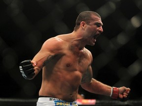 Brazil's Ultimate Fighting Championship (UFC) fighter Mauricio Shogun Rua celebrates after defeating Forrest Griffin of the U.S. during the UFC Rio, a professional mixed martial arts (MMA) competition in Rio de Janeiro August 27, 2011. (REUTERS/Ricardo Moraes)