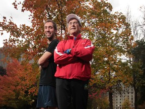 Nelson Wiebe and Don Wright take a break from training Saturday at Confederation Park. They’ll be running in the Ottawa Fall Colours Marathon Sunday.(TONY CALDWELL/Ottawa Sun)