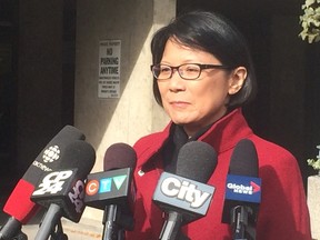Olivia Chow speaks to reporters on Saturday, Oct. 11, 2014. (DON PEAT/Toronto Sun)