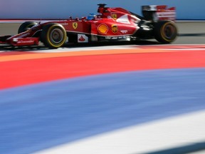 Fernando Alonso takes a lap during practice at the Russian Grand Prix. (REUTERS)