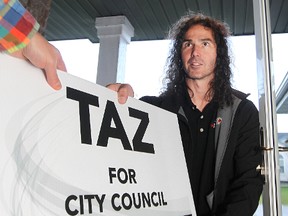 Taz Stuart, who's squaring off against incumbent John Orlikow in the River Heights-Fort Garry riding, campaigns in the Linden Ridge area on Wed., Oct. 8, 2014. (Kevin King/Winnipeg Sun/QMI Agency)