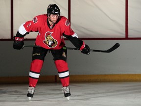 The 2014-15 Ottawa Senators training camp opened up at Canadian Tire Centre in Ottawa Thursday Sept 18,  2014. Ottawa Senator Jared Cowen shoots some TSN videos and photos during Thursday's camp.   Tony Caldwell/Ottawa Sun/QMI Agency