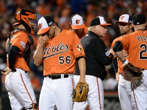 Baltimore Orioles relief pitcher Darren O'Day (56) is pulled in the ninth inning Saturday against the Kansas City Royals in Game 2 of the ALCS. (USA TODAY Sports)