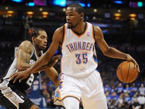Thunder star Kevin Durant will miss six to eight weeks with a fractured bone in his foot. (USA Today Sports)