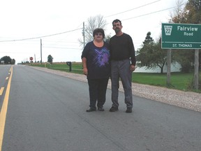 Carolyn and Stephen Plaunt stand near the corner of John Wise Line and Fairview Rd., where rumble strips once alerted motorists they were approaching a stop sign.