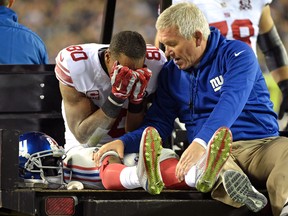 New York Giants wide receiver Victor Cruz is carted off the field after an injury against the Philadelphia Eagles at Lincoln Financial Field in Philadelphia, Oct. 12, 2014. (ERIC HARTLINE/USA Today)