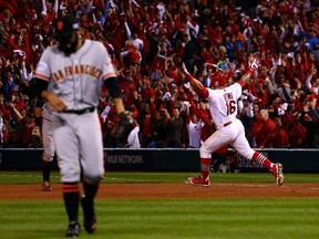 Cardinals’ Kolten Wong celebrates his solo home run in the ninth inning to give St. Louis a 5-4 win over the Giants. (AFP)