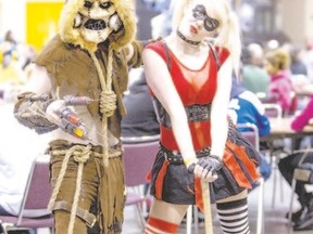 Joey MacDonald, left, dressed as Arkham Scarecrow from Batman with Makenzie Smith as Harley Quinn, also from Batman, at Toronto ComiCon in March. (Ernest Doroszuk, QMI Agency)