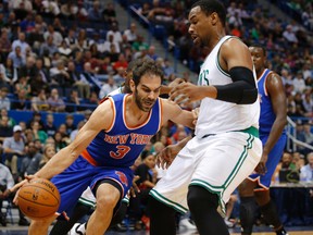 New York Knicks guard Jose Calderon drives the ball against Boston Celtics center Jared Sullinger (David Butler II-USA TODAY Sports)