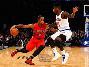 Raptors all-star DeMar DeRozan drives to the hoop against the Knicks’ Iman Shumpert in New York Sunday night. (AFP)