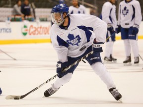 Maple Leafs forward David Clarkson goes wide around a glove before shooting during a drill at the Air Canada Centre on Oct. 13, 2014. (JACK BOLAND/Toronto Sun)