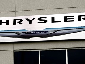 The Chrysler logo is seen outside the Chrysler auto dealer in Broomfield, Colorado October 1, 2014. REUTERS/Rick Wilking