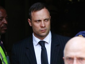 South African Olympic and Paralympic sprinter Oscar Pistorius leaves the North Gauteng High Court in Pretoria October 14, 2014. (REUTERS)