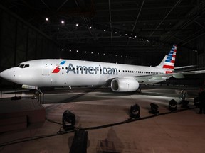 A Boeing 737-800 aircraft with the new American Airlines logo and livery is shown in this undated handout photo. REUTERS/American Airlines/Handout