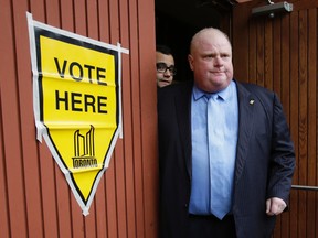 Mayor Rob Ford votes at an advance poll located in St. Giles church in Etobicoke on  Oct. 14, 2014. (Craig Robertson/Toronto Sun)