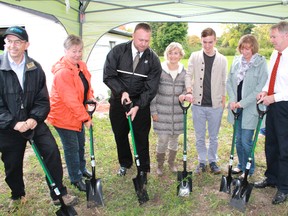 Habitat for Humanity kicked off its 32nd home in Lambton County with a groundbreaking ceremony on the site of its latest build, on East Street South on October 6. From left to right: Habitat for Humanity's Dave Butler, Libro Credit Union's Theresa Vankoeverden, Home Depot's Mike Patterson, Peg Dawkins, Shane Groves, Karen Groves, Mayor Mike Bradley. (CARL HNATYSHYN/SARNIA THIS WEEK/QMI AGENCY)