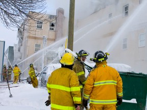 Firefighters battle hotspots at the Bonnyville Hotel. The fire was reported just after 2:20 a.m. Dec. 16 and was active into the afternoon. Initial reports from the Bonyville RCMP stated that "several people"  were transported to hospital with non-life threatening injuries.Cold Lake Sun/QMI