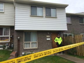 Toronto Police at the scene in North York Tuesday, Oct. 14, 2014, after a four-year-old boy was found dead. (Chris Doucette/Toronto Sun)