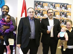Gino Donato/The Sudbury Star    
MPs Claude Gravelle and Glenn Thibeault address media to announce  NDP Leader Tom Mulcair's plan to create affordable child-care spaces in Canada.