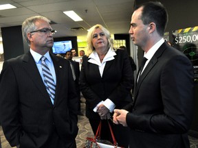 David Ciccarelli (right), CEO and co-founder of voices.com, provides a tour of the company’s downtown London offices October 15, 2014 to Gary Goodyear, minister of state for Fed Dev Ontario, and Susan Truppe, London North Centre MP. CHRIS MONTANINI\LONDONER\QMI AGENCY